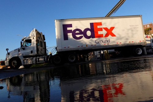 FedEx cuts full-year results forecast as it struggles to replace USPS contract loss