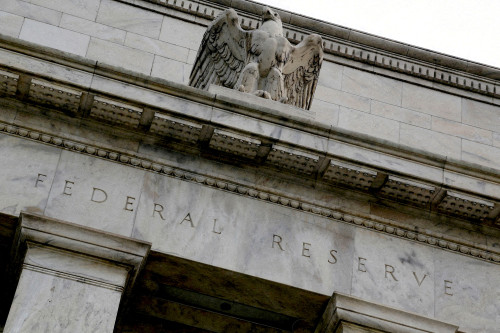 Fed paper says risk of falling back to near zero rates still in play